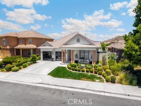 2056 Caltha Way, Perris, CA 92571 - view of front of property featuring a garage and driveway