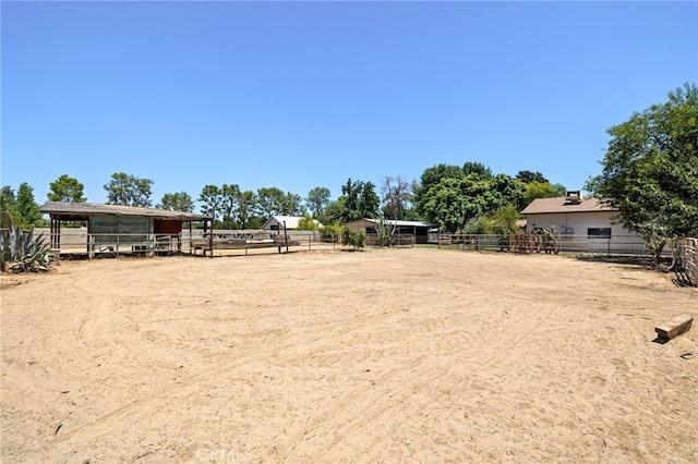 921 Christian Ave, Bakersfield, CA 93314 - view of yard with an exterior structure, an outdoor structure, and an enclosed horse arena