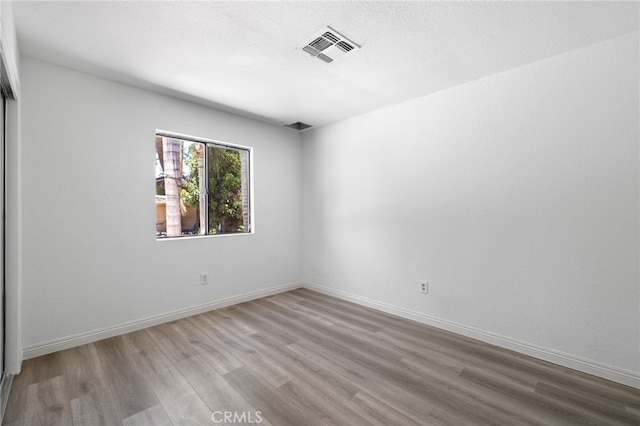 921 Christian Ave, Bakersfield, CA 93314 - unfurnished room featuring wood finished floors and baseboards