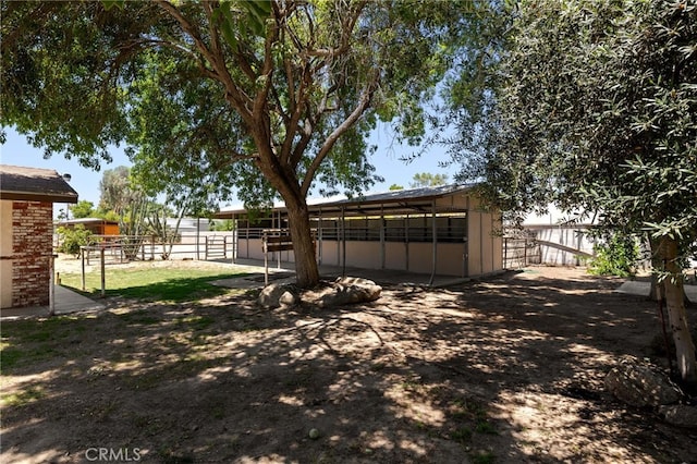 921 Christian Ave, Bakersfield, CA 93314 - view of yard with an exterior structure and an outbuilding