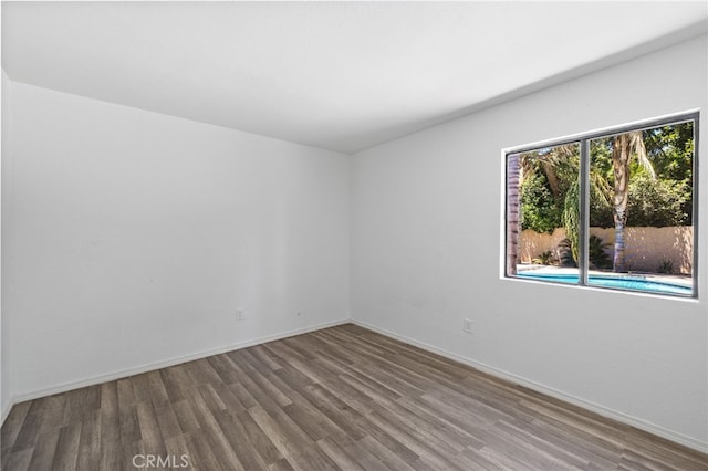 921 Christian Ave, Bakersfield, CA 93314 - unfurnished room featuring wood finished floors and baseboards