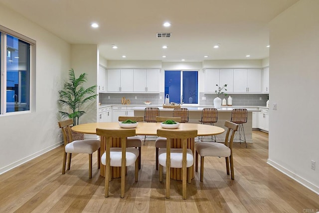 6140 Colt Pl Unit 104, Carlsbad, CA 92009 - dining space with light wood-type flooring and recessed lighting
