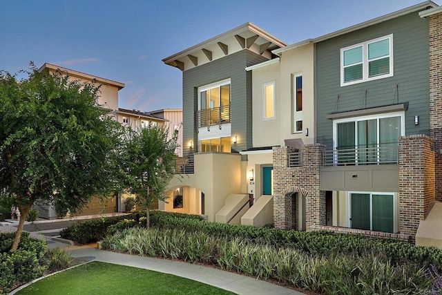 6140 Colt Pl Unit 104, Carlsbad, CA 92009 - view of front of home with stucco siding