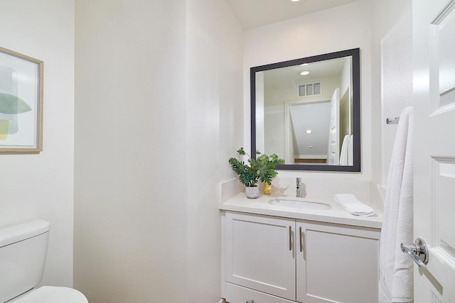 6140 Colt Pl Unit 104, Carlsbad, CA 92009 - half bathroom featuring vanity and toilet