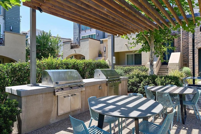 6140 Colt Pl Unit 104, Carlsbad, CA 92009 - view of patio featuring outdoor dining space and area for grilling