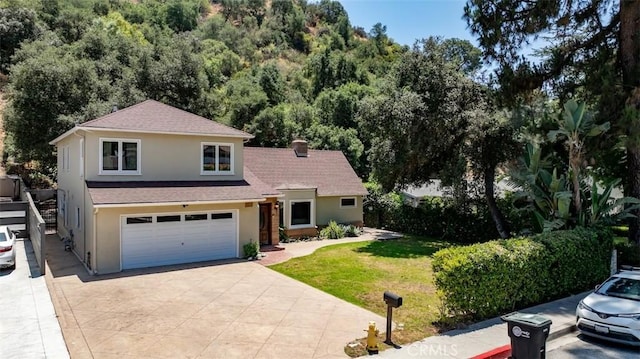 2248 E Chevy Chase Dr, Glendale, CA 91206 - view of front of home featuring stucco siding, driveway, a garage, a front yard, and a shingled roof