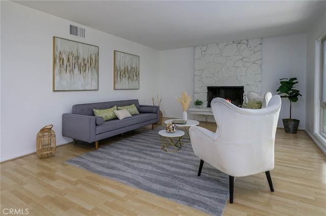 4931 Saint Andrews Ave, Buena Park, CA 90621 - living room with wood finished floors and a fireplace