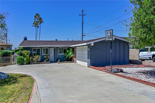 4931 Saint Andrews Ave, Buena Park, CA 90621 - view of front facade with an attached garage, concrete driveway, and brick siding