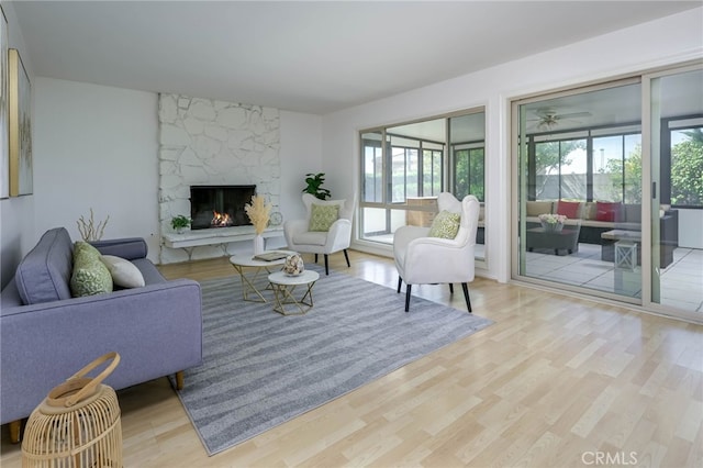 4931 Saint Andrews Ave, Buena Park, CA 90621 - living area with wood finished floors and a fireplace