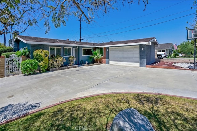 4931 Saint Andrews Ave, Buena Park, CA 90621 - ranch-style home featuring a garage, concrete driveway, and brick siding