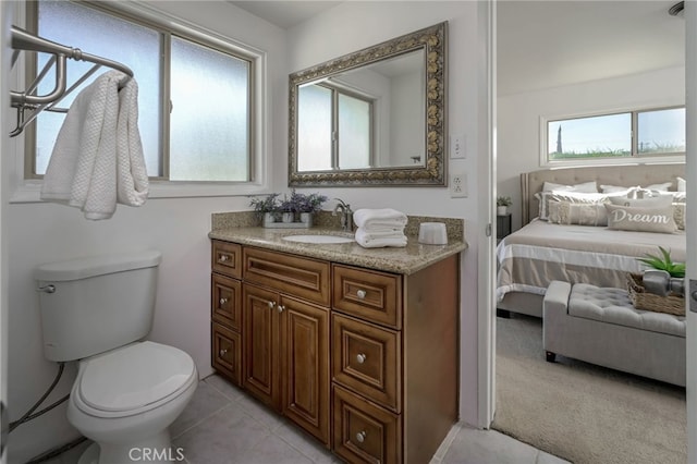 4931 Saint Andrews Ave, Buena Park, CA 90621 - bathroom featuring vanity, ensuite bath, and tile patterned flooring