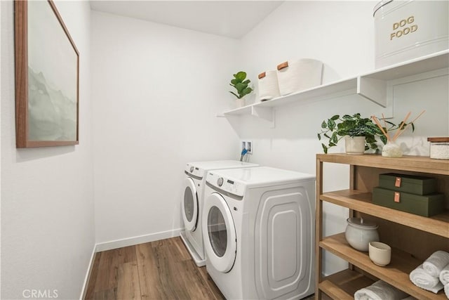 4830 Arroyo Run, Moorpark, CA 93021 - laundry room with washer and dryer and wood finished floors