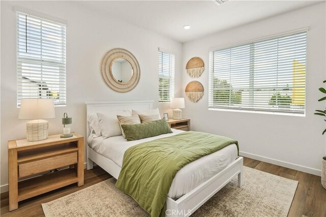 4830 Arroyo Run, Moorpark, CA 93021 - bedroom with baseboards and wood finished floors