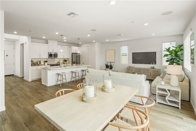 4830 Arroyo Run, Moorpark, CA 93021 - dining space featuring recessed lighting and light wood-style flooring