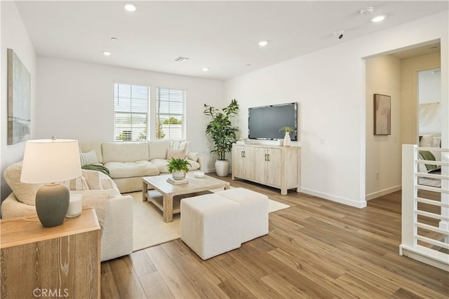 4830 Arroyo Run, Moorpark, CA 93021 - living room featuring light wood-style flooring and recessed lighting