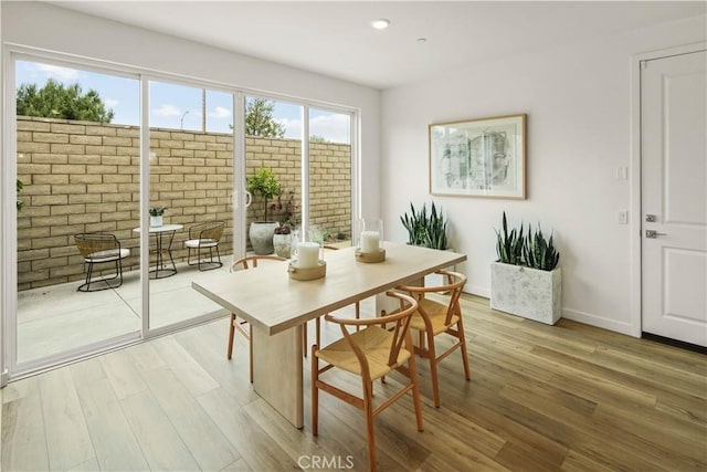 4830 Arroyo Run, Moorpark, CA 93021 - dining space featuring light wood finished floors and recessed lighting