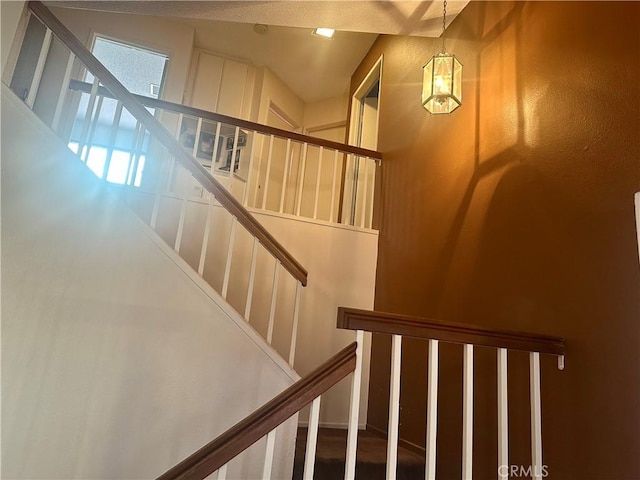 3539 Castaic, Riverside, CA 92501 - stairs with a chandelier