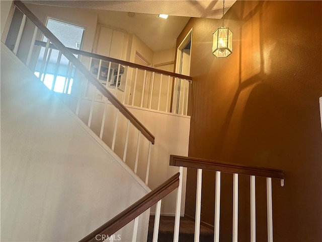 3539 Castaic, Riverside, CA 92501 - stairs with a chandelier