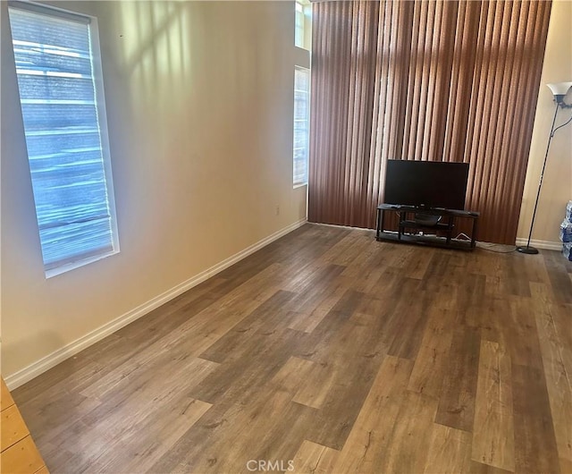 3539 Castaic, Riverside, CA 92501 - unfurnished living room with wood finished floors and baseboards