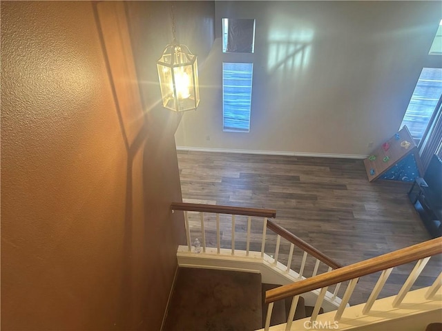 3539 Castaic, Riverside, CA 92501 - staircase with wood finished floors and baseboards
