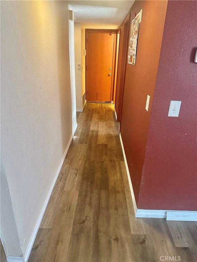 3539 Castaic, Riverside, CA 92501 - corridor with wood finished floors and baseboards