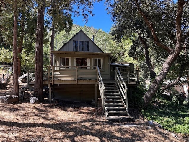 41132 Oak Dr, Forest Falls, CA 92339 - back of house with stairway and a deck