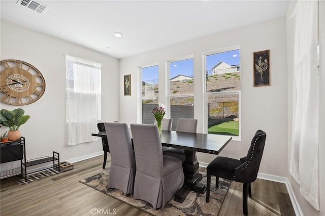 28709 Wildflower, Castaic, CA 91384 - dining room with wood finished floors and baseboards