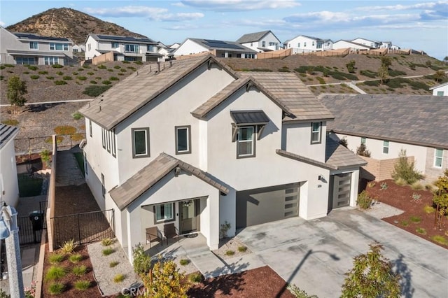 28709 Wildflower, Castaic, CA 91384 - view of front of house featuring stucco siding, driveway, and an attached garage