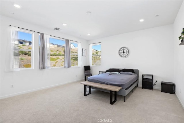 28709 Wildflower, Castaic, CA 91384 - bedroom featuring light colored carpet, multiple windows, and recessed lighting