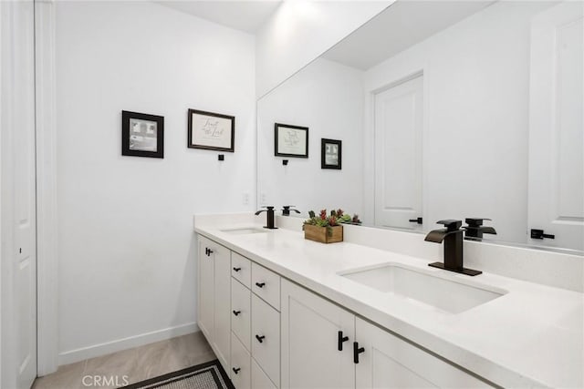 28709 Wildflower, Castaic, CA 91384 - full bathroom featuring double vanity and baseboards