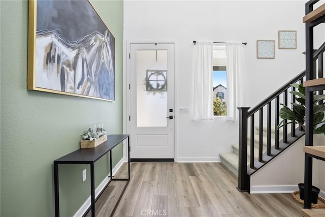 28709 Wildflower, Castaic, CA 91384 - entryway with wood finished floors and stairway