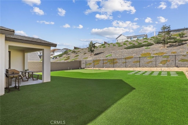 28709 Wildflower, Castaic, CA 91384 - fenced backyard featuring an area to practice putting and a patio