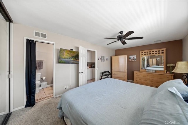 3911 Bryce Ct, Chino, CA 91710 - carpeted bedroom featuring a ceiling fan and ensuite bath