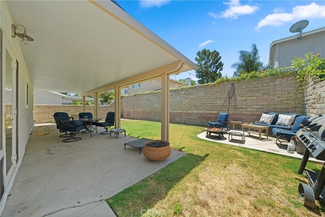 3911 Bryce Ct, Chino, CA 91710 - fenced backyard with an outdoor living space with a fire pit and a patio