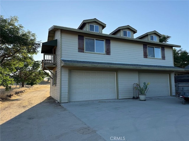 6535 Odonovan Rd, Creston, CA 93432 - view of front of home featuring a garage, driveway, and a balcony