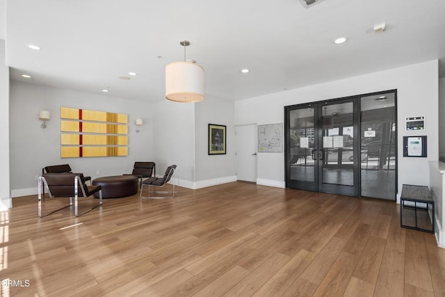 931 E Walnut St Unit 612, Pasadena, CA 91106 - living room featuring light wood-style flooring and recessed lighting