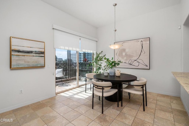 931 E Walnut St Unit 612, Pasadena, CA 91106 - dining space featuring baseboards and light stone finish floors