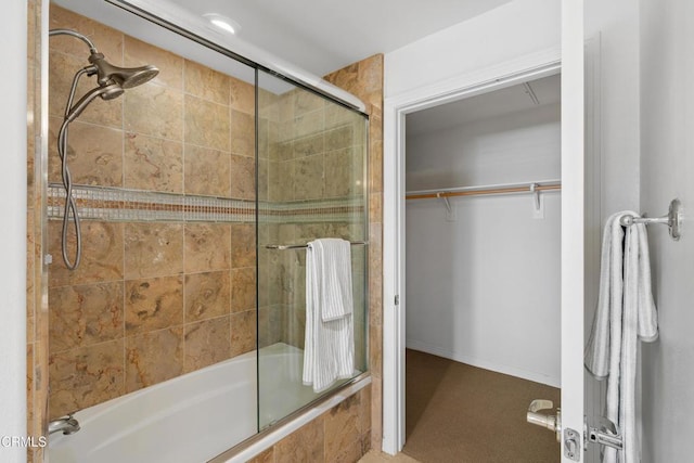 931 E Walnut St Unit 612, Pasadena, CA 91106 - bathroom with tiled shower / bath combo and a spacious closet