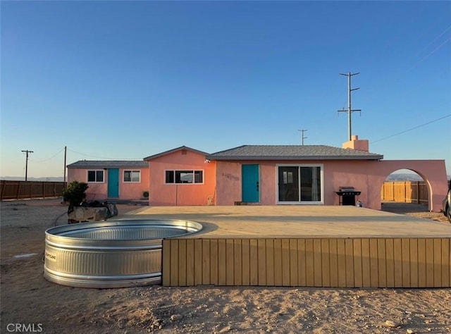 3191 Pearl Springs Ave Unit 29, Palms, CA 92277 - rear view of house featuring stucco siding