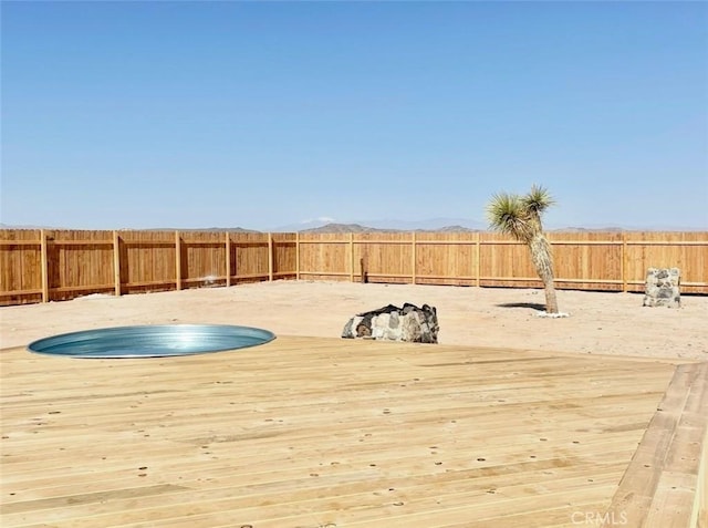 3191 Pearl Springs Ave Unit 29, Palms, CA 92277 - deck with a fenced backyard