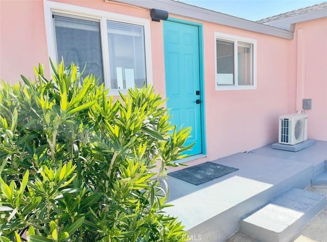 3191 Pearl Springs Ave Unit 29, Palms, CA 92277 - view of exterior entry featuring stucco siding