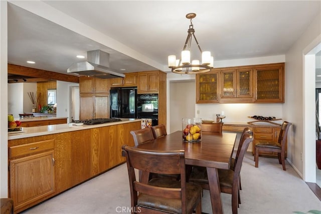 8652 Surrey Ln, Rancho Cucamonga, CA 91701 - dining space featuring a chandelier, light colored carpet, and recessed lighting