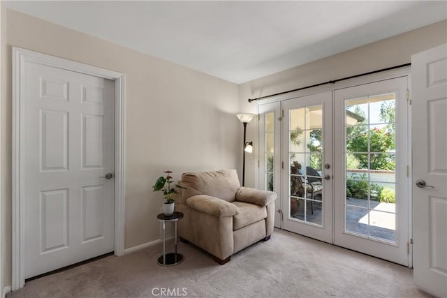 8652 Surrey Ln, Rancho Cucamonga, CA 91701 - living area featuring french doors and carpet flooring