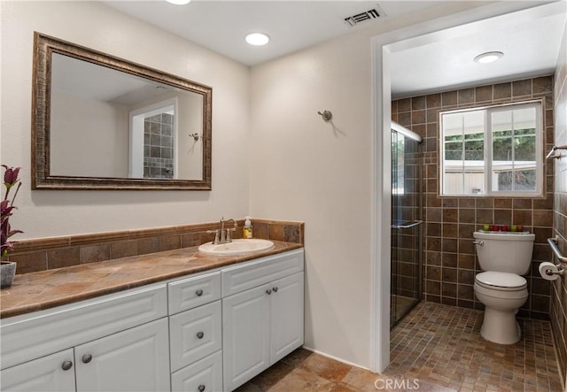 8652 Surrey Ln, Rancho Cucamonga, CA 91701 - full bath with vanity, a shower stall, and tile patterned flooring