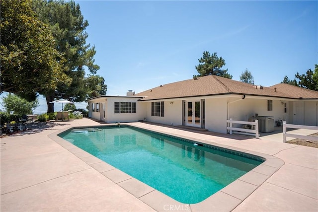 8652 Surrey Ln, Rancho Cucamonga, CA 91701 - swimming pool featuring a patio area and french doors