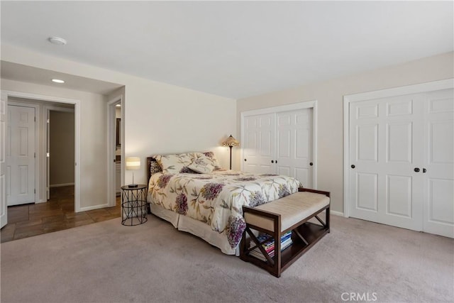 8652 Surrey Ln, Rancho Cucamonga, CA 91701 - carpeted bedroom featuring multiple closets and recessed lighting