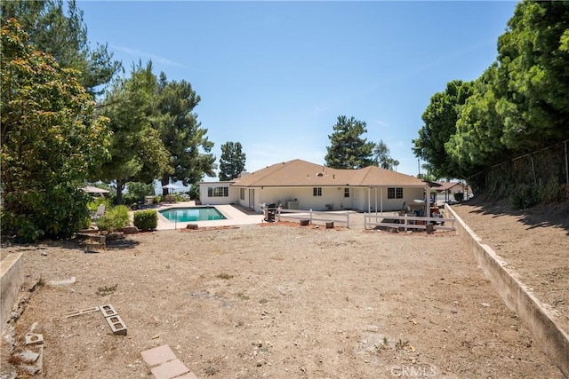 8652 Surrey Ln, Rancho Cucamonga, CA 91701 - back of property with a patio area