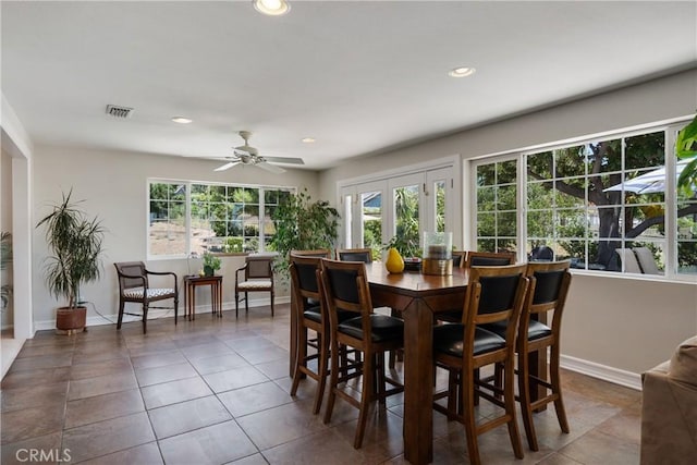 8652 Surrey Ln, Rancho Cucamonga, CA 91701 - dining room with healthy amount of natural light, tile patterned flooring, recessed lighting, and a ceiling fan