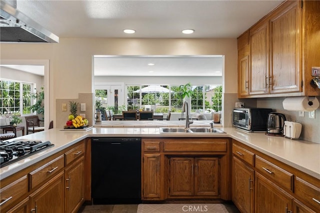 8652 Surrey Ln, Rancho Cucamonga, CA 91701 - kitchen featuring black dishwasher, plenty of natural light, light countertops, gas cooktop, and recessed lighting