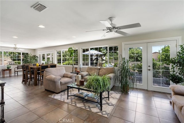 8652 Surrey Ln, Rancho Cucamonga, CA 91701 - living area with french doors, ceiling fan, plenty of natural light, recessed lighting, and tile patterned floors